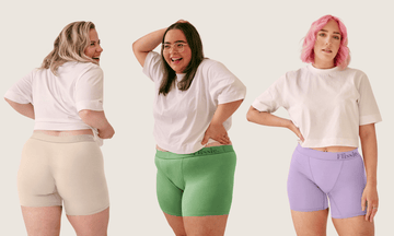 Pairs of women's boxer shorts from several brands laid flat side by side to compare leg length