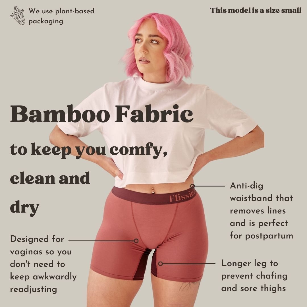Model wearing pink Flissie womens boxers in a size small