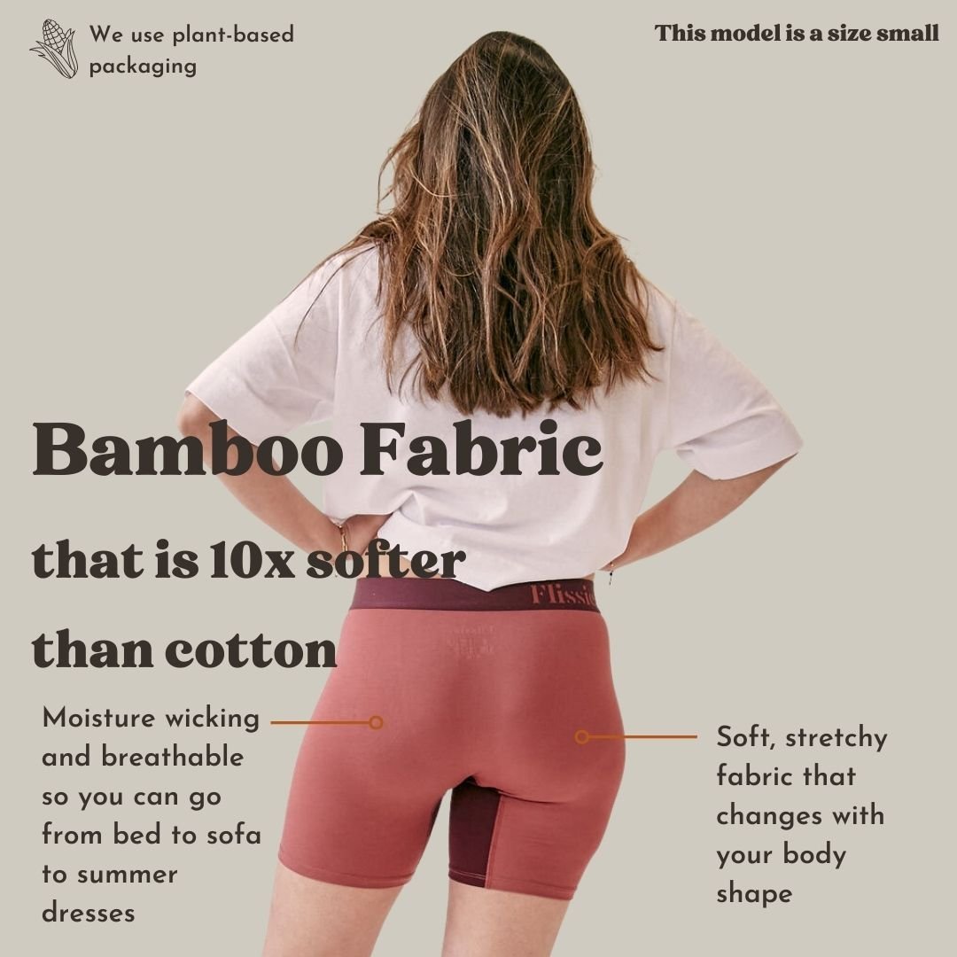 Model wearing plum pink Flissie womens boxers in a size small